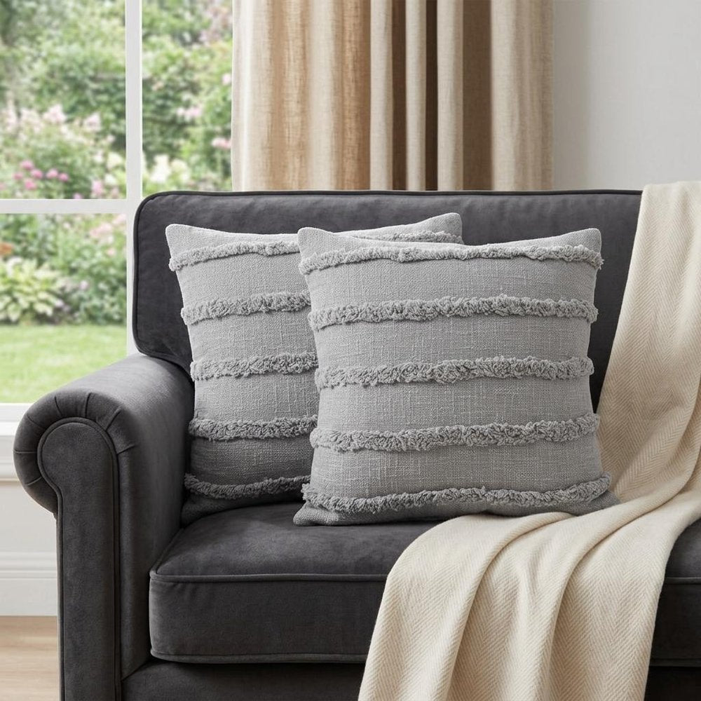 Set of Two Gray Ribbed Cotton Throw Pillow With Fringe in a home interior