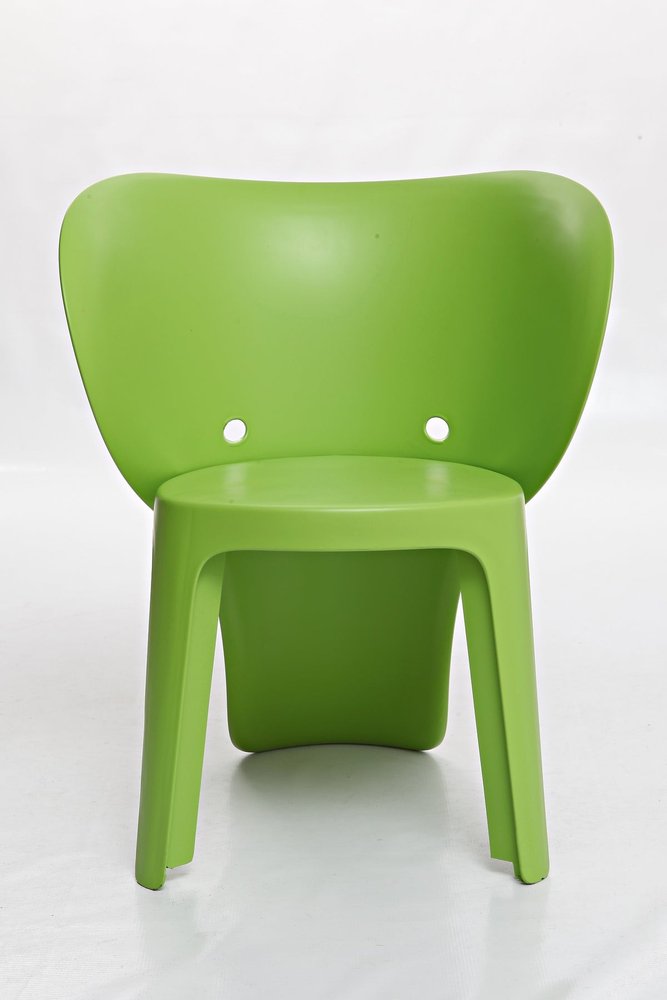 Set Of Four Green Heavy Duty Plastic Juvenile Chairs on a white background