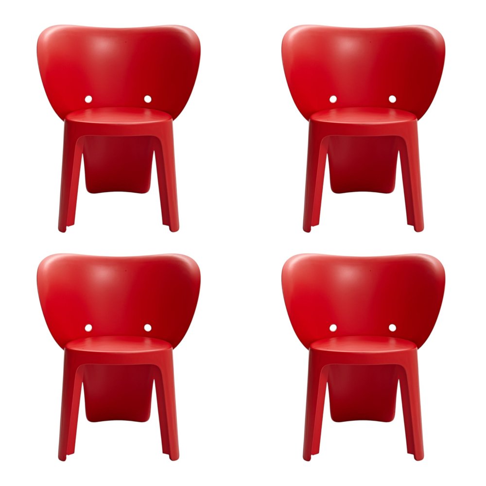 Set Of Four Red Heavy Duty Plastic Juvenile Chairs on a white background