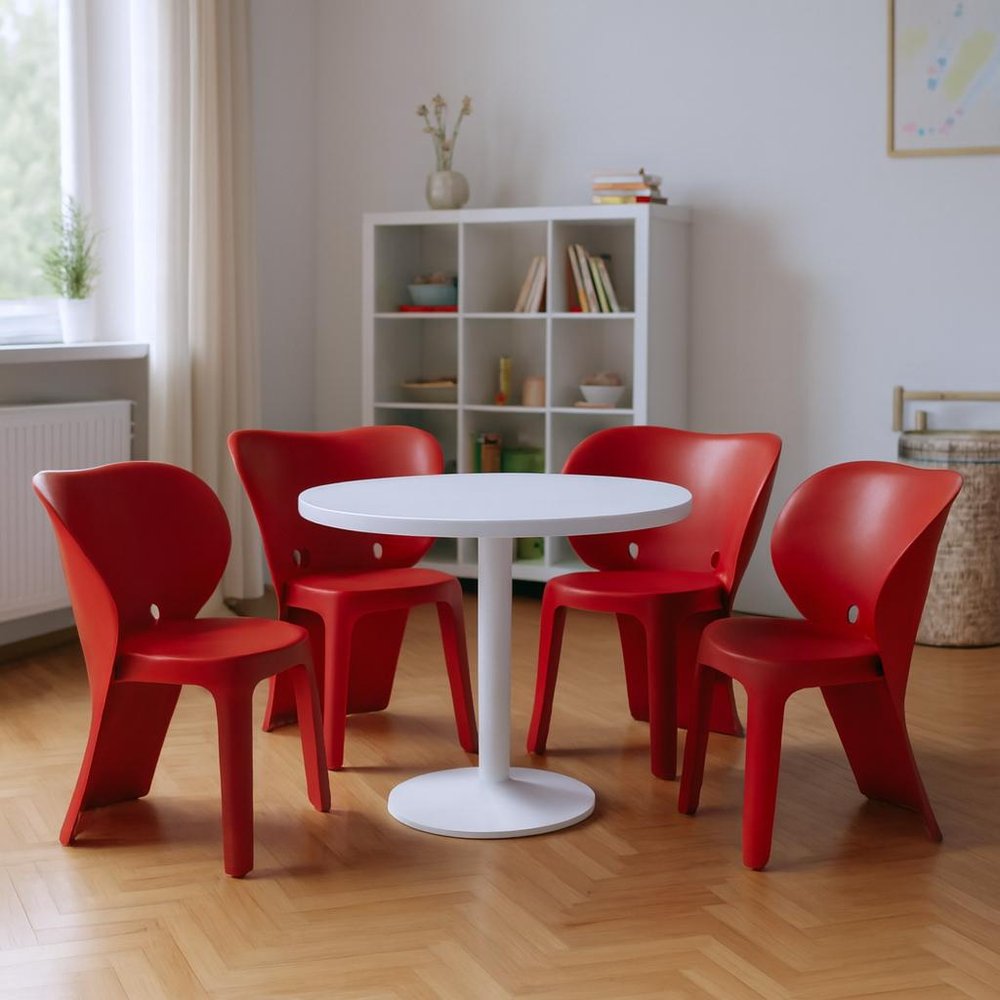 Set Of Four Red Heavy Duty Plastic Juvenile Chairs in a home interior
