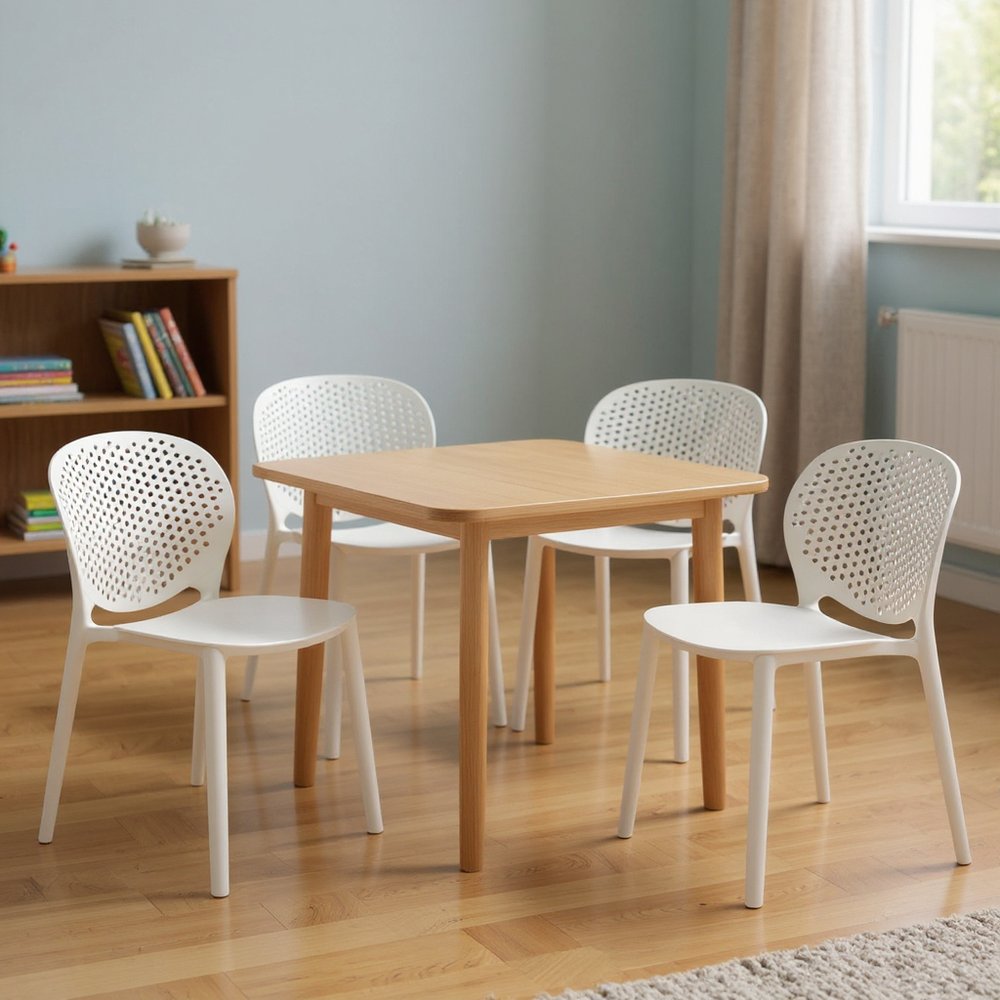 Set Of Four White Heavy Duty Plastic Juvenile Chairs - 23" H x 14" W x 16" D in a home interior