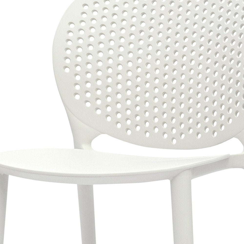 Set Of Four White Heavy Duty Plastic Juvenile Chairs - 23" H x 14" W x 16" D on a white background