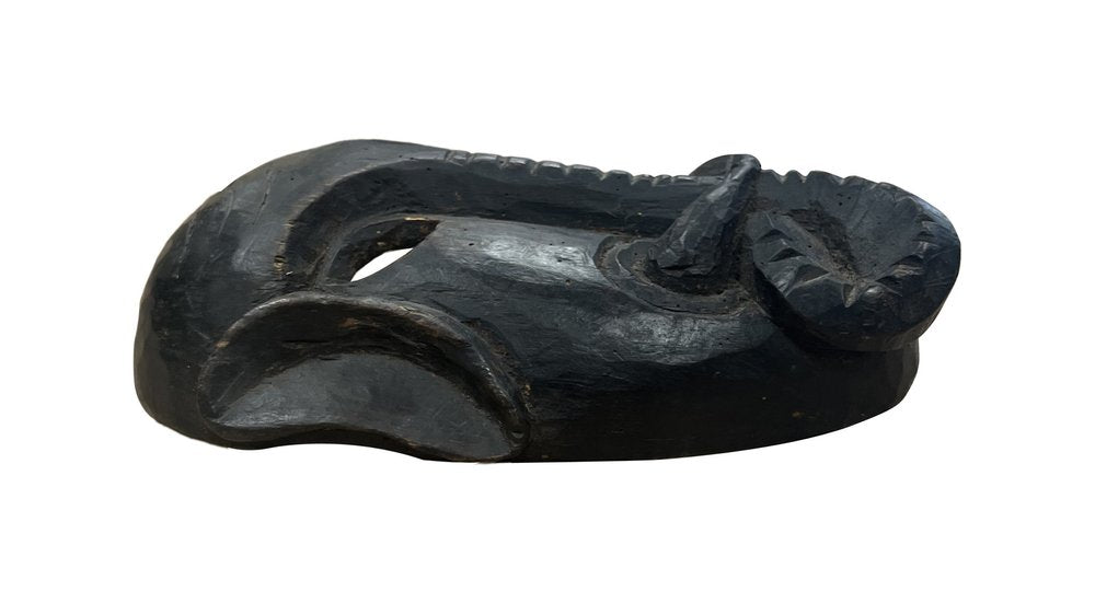 10" Black Solid Wood Decorative Mask Tabletop Sculpture. Sculpture isolated on a plain white background, finished in black wood.