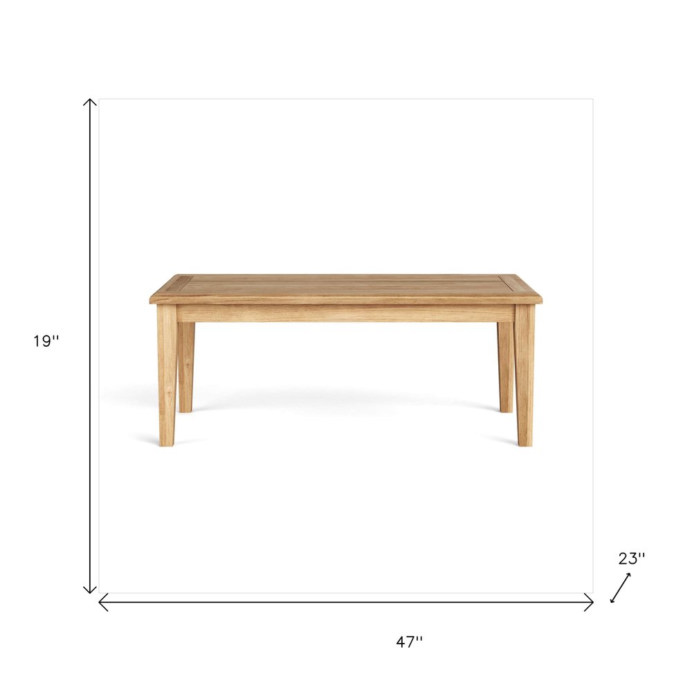 47" Natural Solid Wood Outdoor Coffee Table - 19" H x 47" W x 23" D. Outdoor table isolated on a plain white background, showing a tan wood surface.