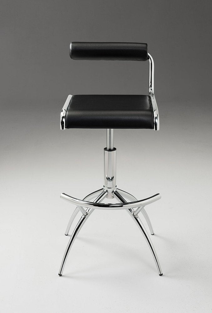 Set of Two Black And Silver Faux Leather And Metal Low Back Adjustable Height Bar Chairs in a home interior