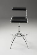 Set of Two Black And Silver Faux Leather And Metal Low Back Adjustable Height Bar Chairs in a home interior