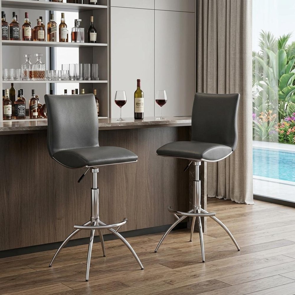 Set of Two Brown And Silver Faux Leather And Metal Low Back Adjustable Height Swivel Bar Chairs in a home interior