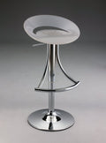 White And Silver Acrylic And Metal Low Back Adjustable Height Bar Chair in a home interior