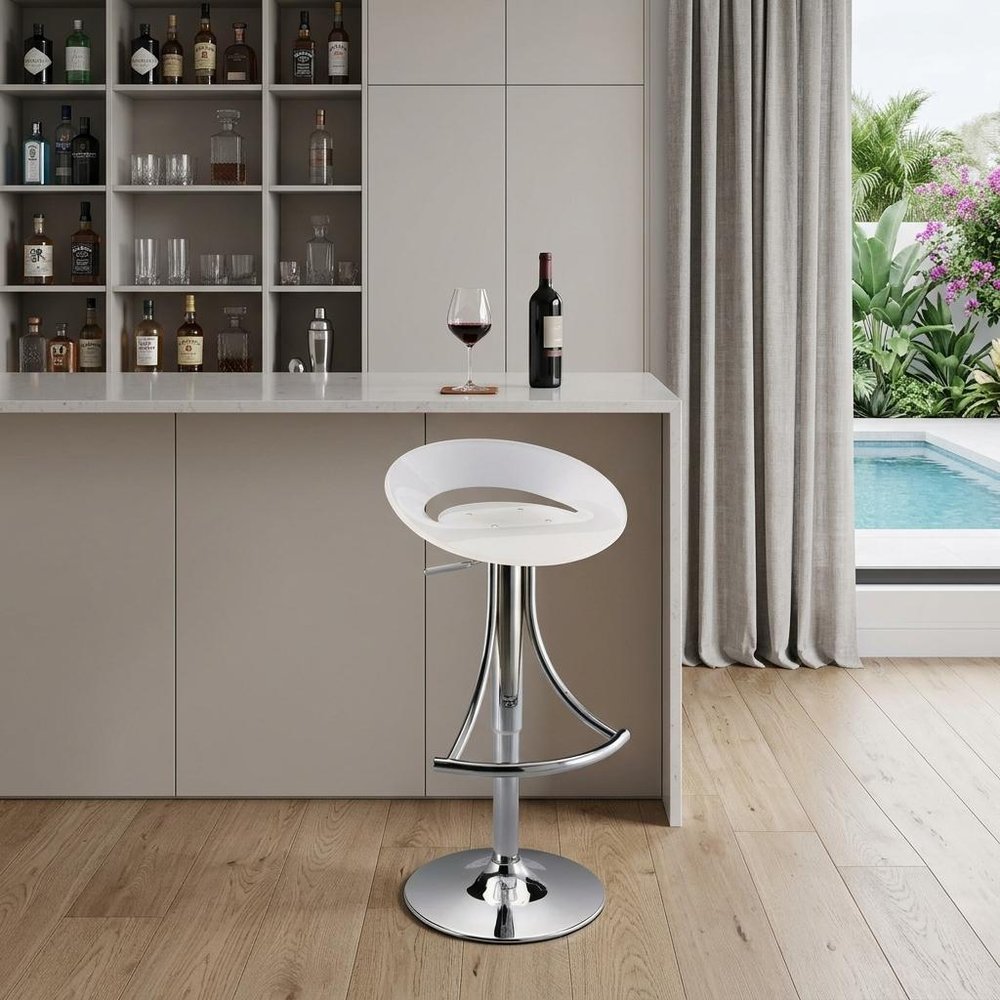 White And Silver Acrylic And Metal Low Back Adjustable Height Bar Chair in a home interior