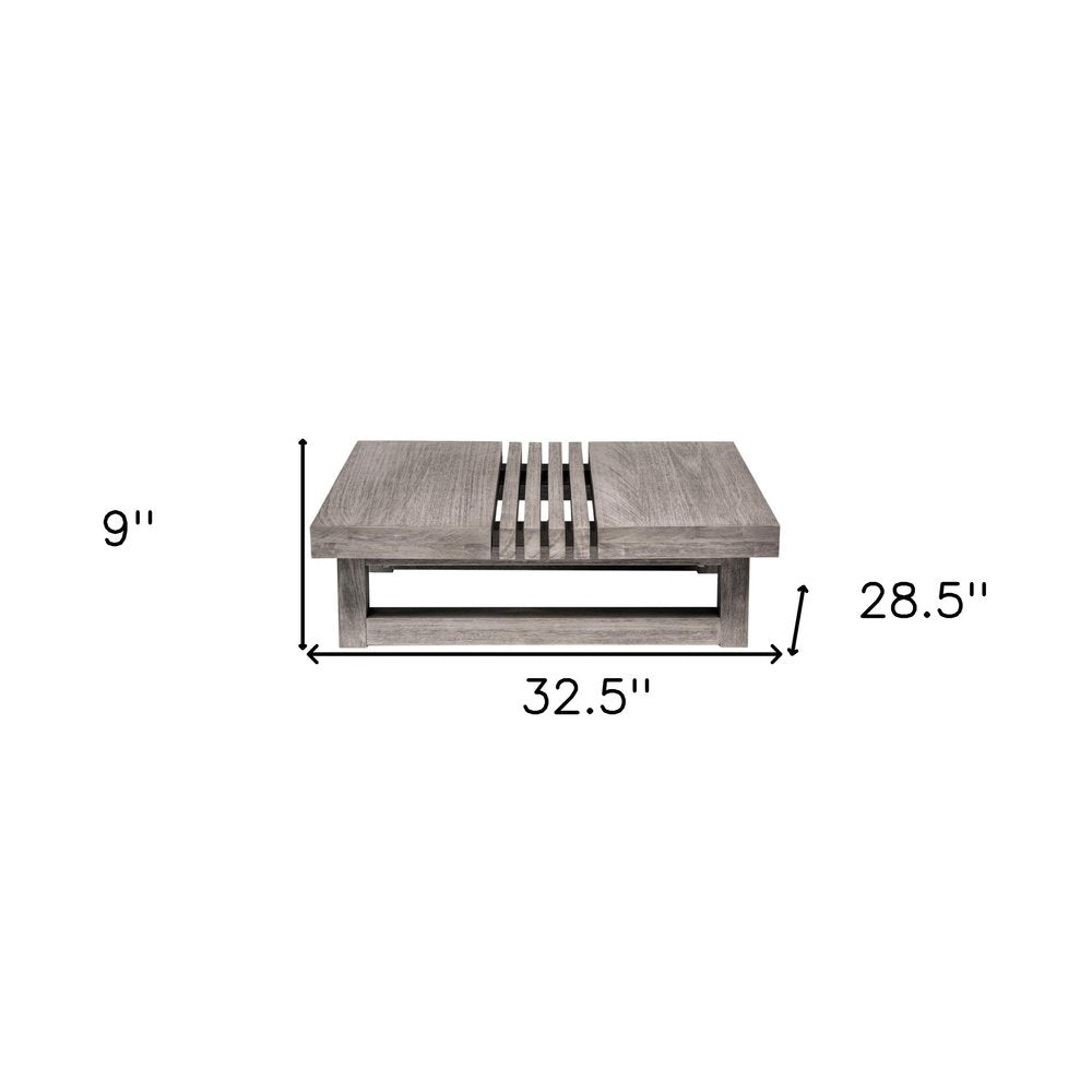 33" Gray Solid Wood Outdoor Coffee Table. Outdoor table isolated on a plain white background, in a gray wood finish.