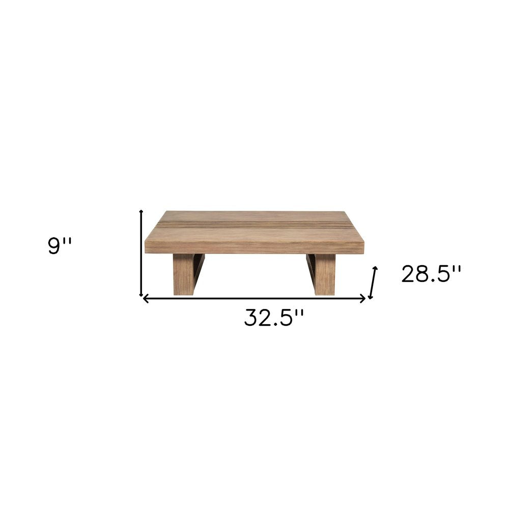 33" Natural Solid Wood Outdoor Coffee Table. Outdoor table isolated on a plain white background, showing a tan wood surface.