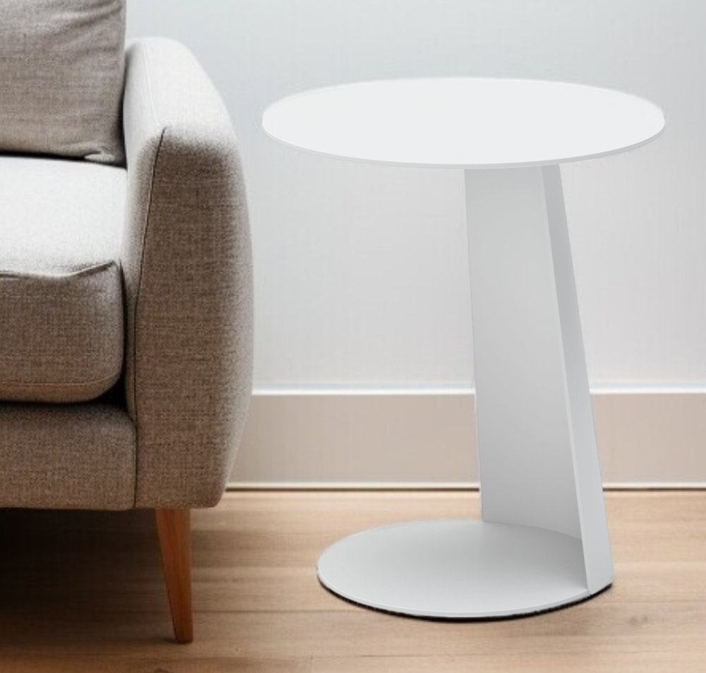 16" White Aluminum Rounded Outdoor Side Table styled in a furnished interior with an off-white wall on a wood floor.