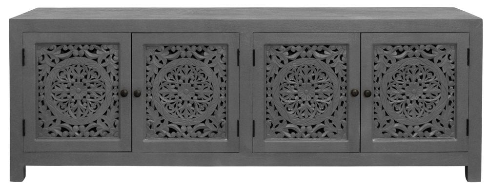 Dark gray solid wood TV stand with four carved floral doors and brass knobs on a white background.