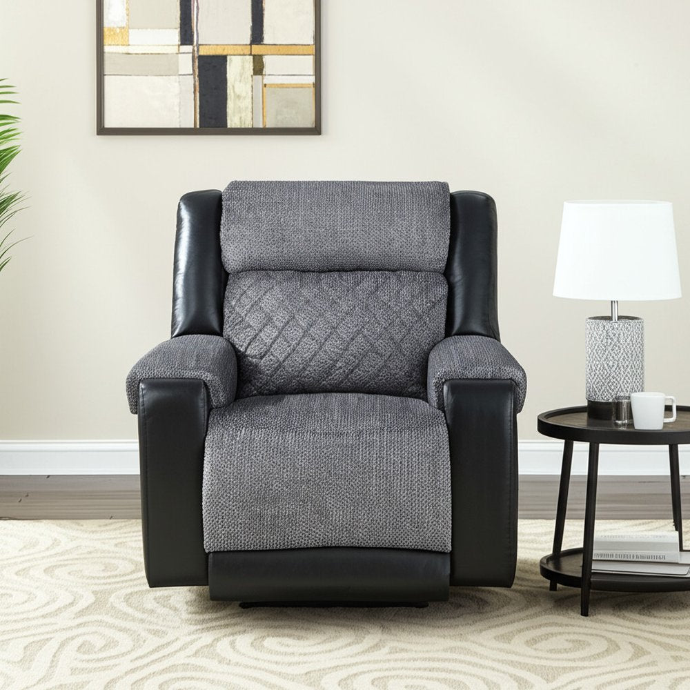 39" Black And Gray Faux Leather And Fabric Manual Recliner. Recliner isolated on a plain white background, in a black faux leather finish.