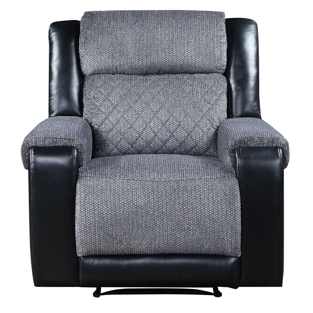 39" Black And Gray Faux Leather And Fabric Manual Recliner. Recliner isolated on a plain white background, in a black faux leather finish.
