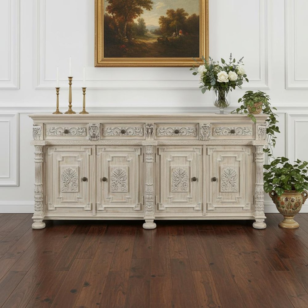 89" White Distressed Solid Wood Carved Scrollwork Four Drawer Sideboard With Four Doors in a home interior