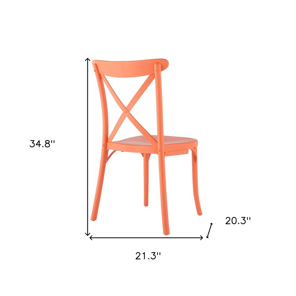 Set of Two Salmon Heavy Duty Plastic Outdoor Stacking Dining Chairs on a white background