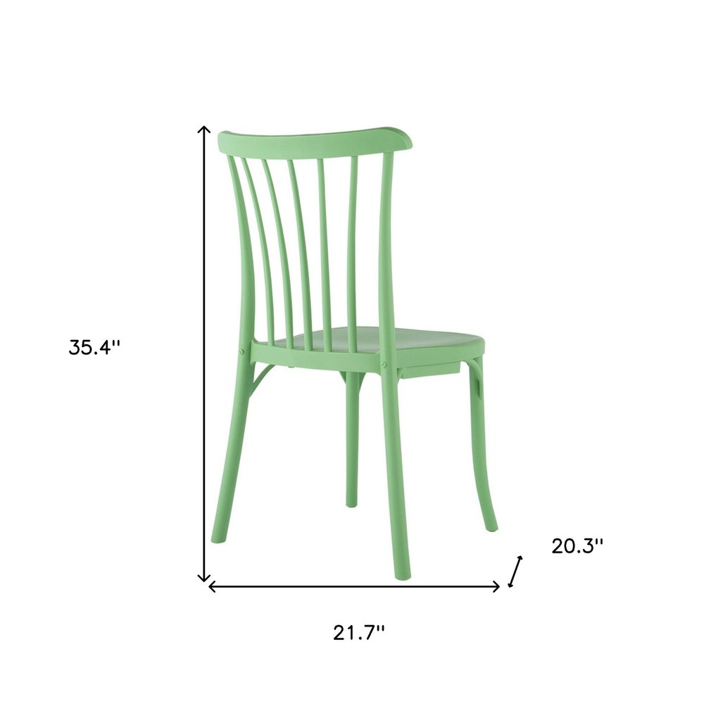 Set of Two Green Heavy Duty Plastic Outdoor Stacking Dining Chairs on a white background