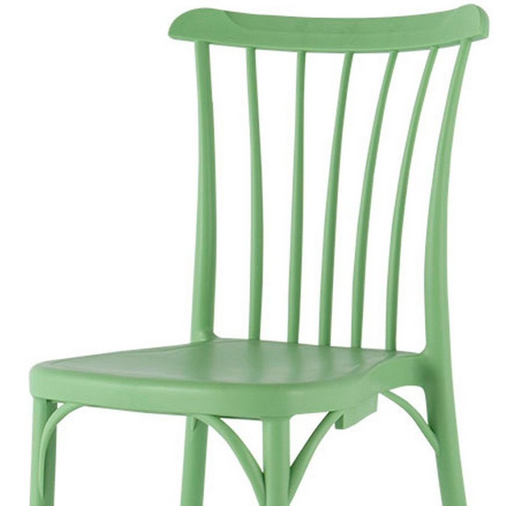 Set of Two Green Heavy Duty Plastic Outdoor Stacking Dining Chairs on a white background