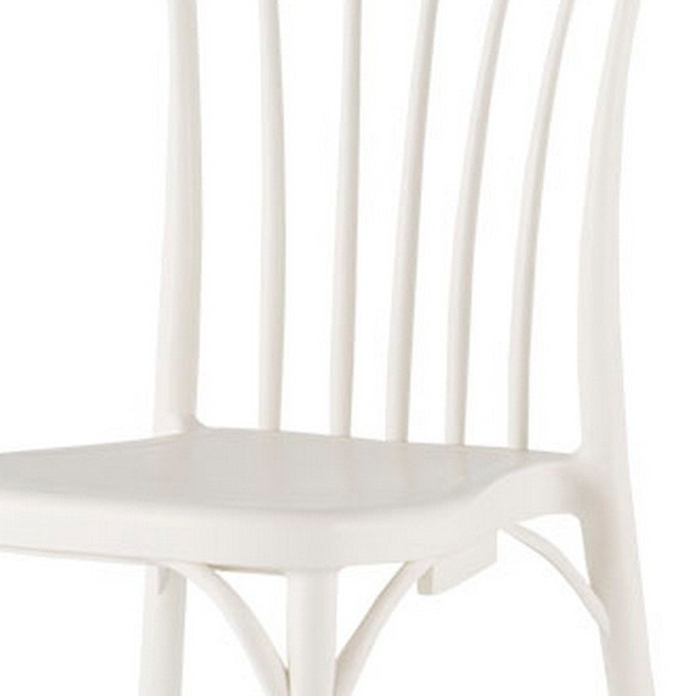 Set of Two White Heavy Duty Plastic Outdoor Stacking Dining Chairs on a white background