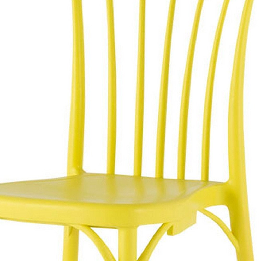 Set of Two Yellow Heavy Duty Plastic Outdoor Stacking Dining Chairs on a white background