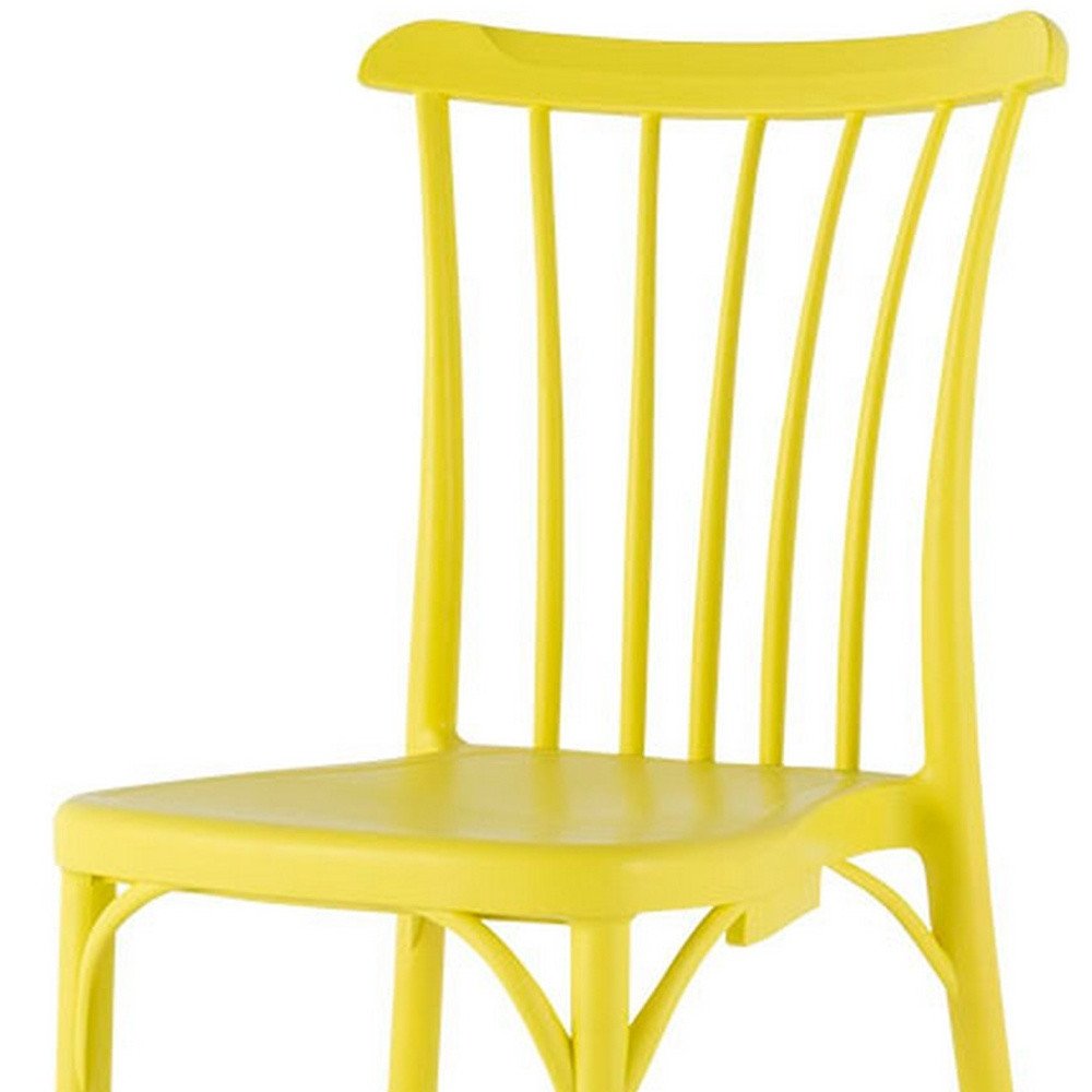 Set of Two Yellow Heavy Duty Plastic Outdoor Stacking Dining Chairs on a white background