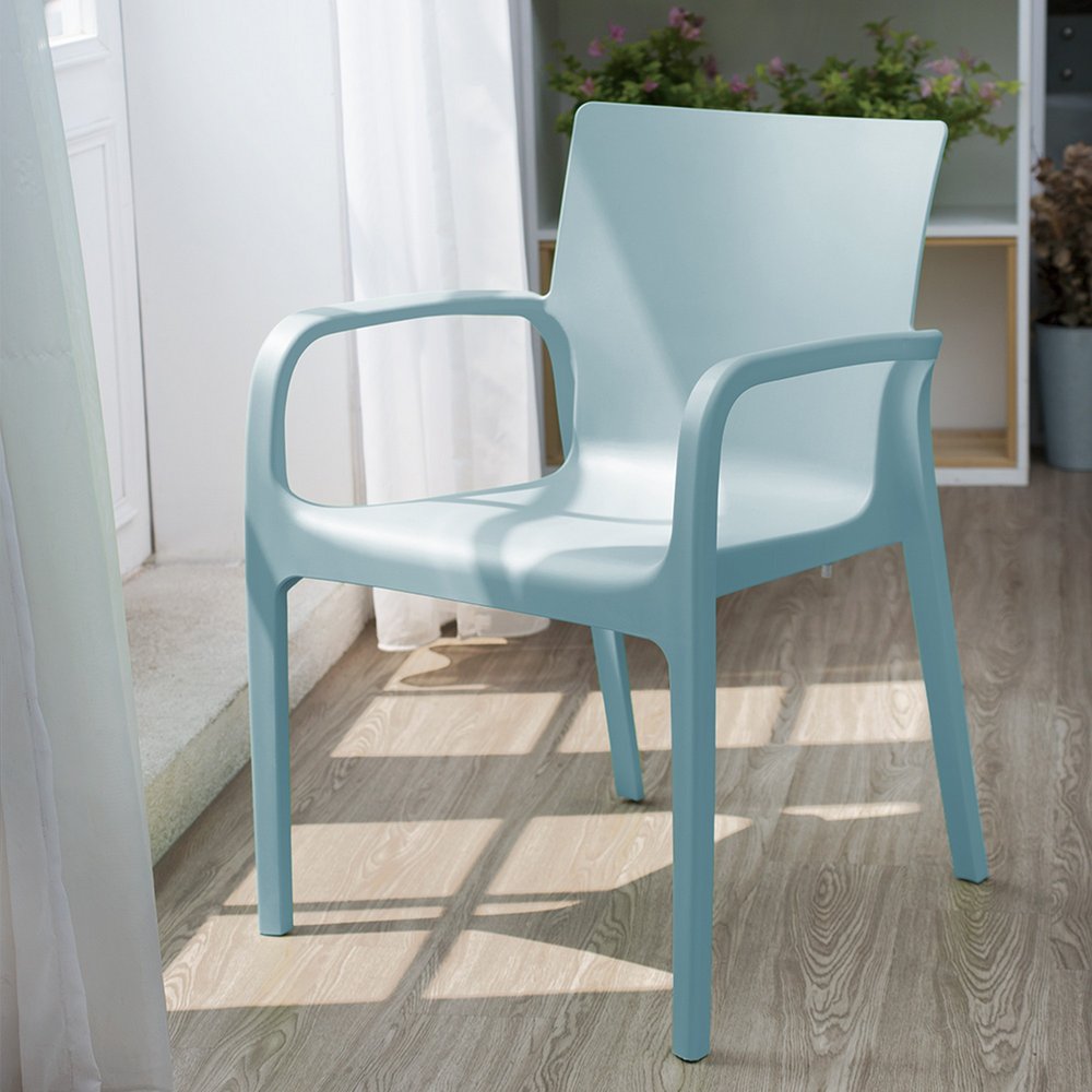 Set of Two Baby Blue Heavy Duty Plastic Outdoor Stacking Dining Chairs in a home interior