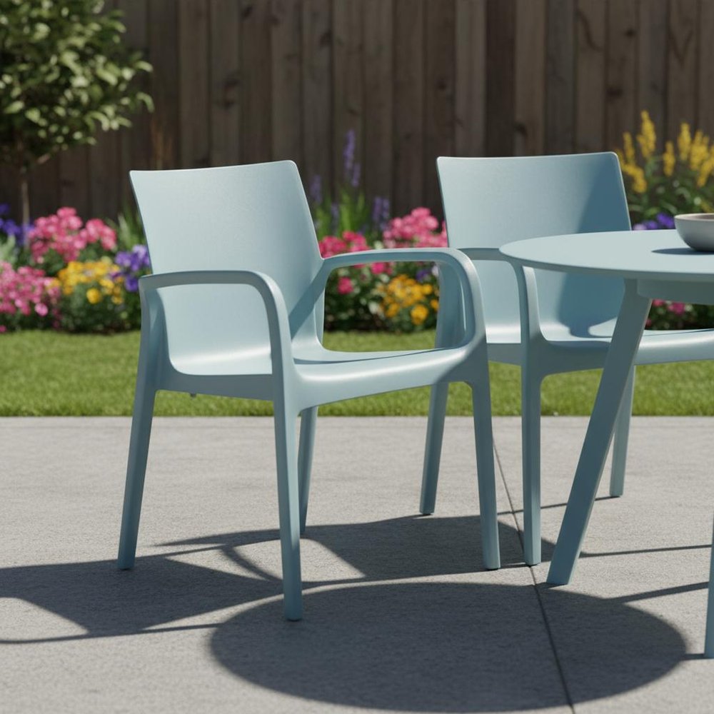 Set of Two Baby Blue Heavy Duty Plastic Outdoor Stacking Dining Chairs in a home interior