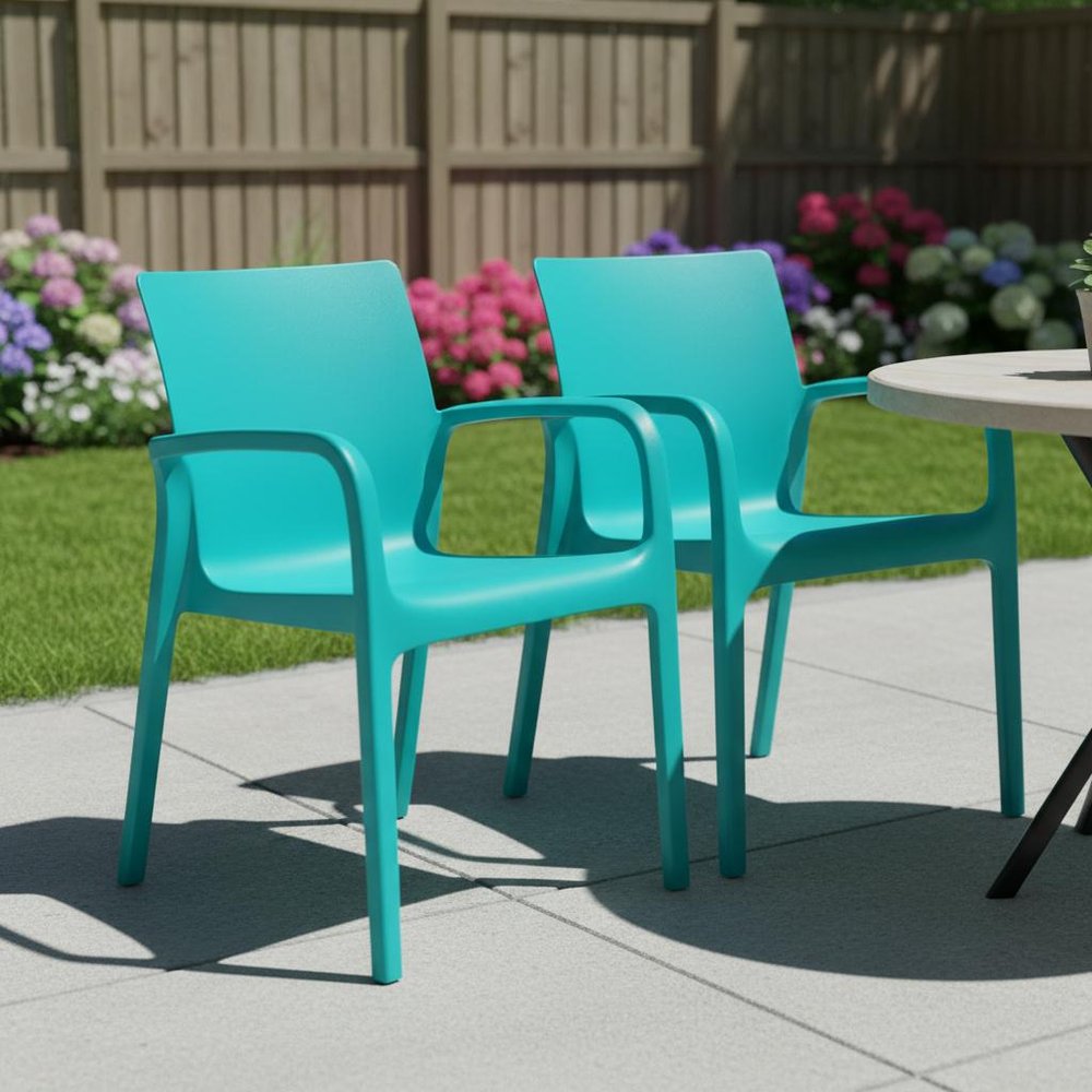 Set of Two Turquoise Heavy Duty Plastic Outdoor Stacking Dining Chairs in a home interior