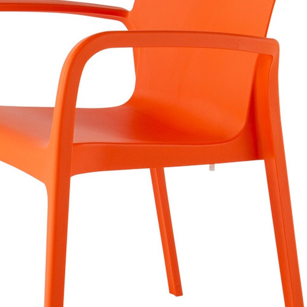Set of Two Orange Heavy Duty Plastic Outdoor Stacking Dining Chairs on a white background
