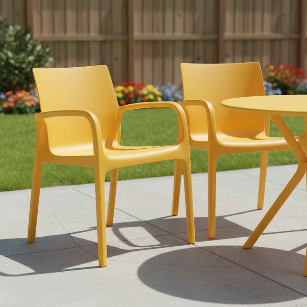 Set of Two Gold Heavy Duty Plastic Outdoor Stacking Dining Chairs in a home interior