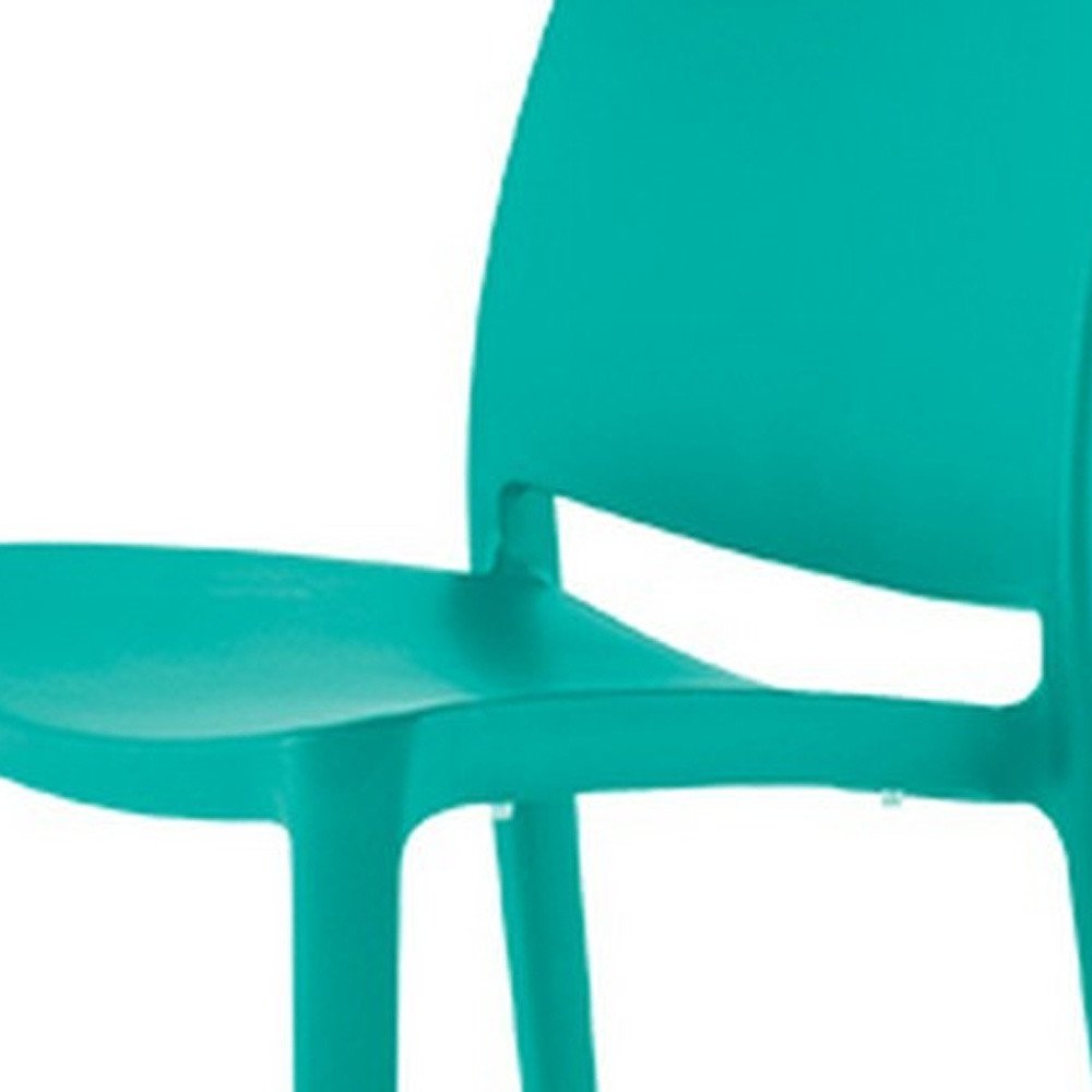 Set of Four Turquoise Heavy Duty Plastic Outdoor Stacking Dining Chairs on a white background