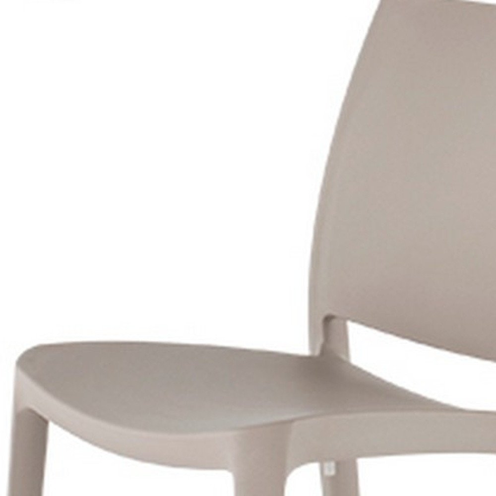 Set of Four Taupe Heavy Duty Plastic Outdoor Stacking Dining Chairs on a white background
