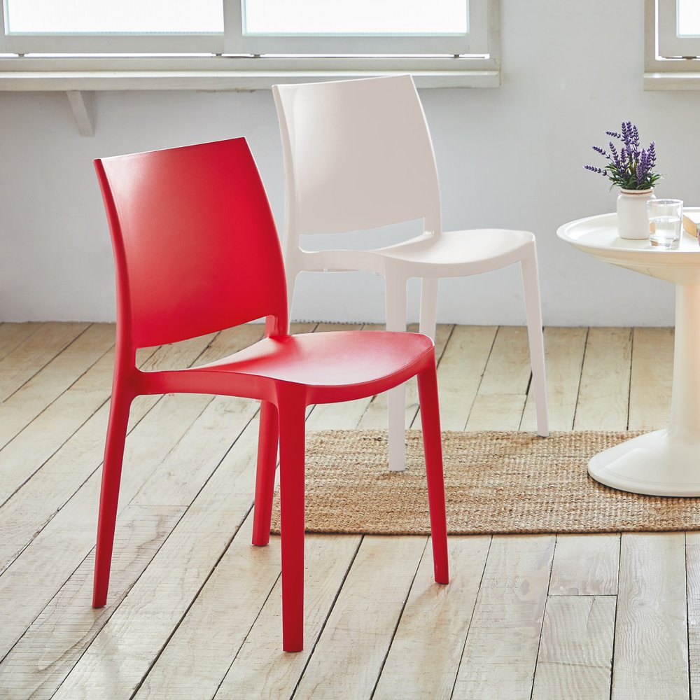 Set of Four Red Heavy Duty Plastic Outdoor Stacking Dining Chairs on a white background