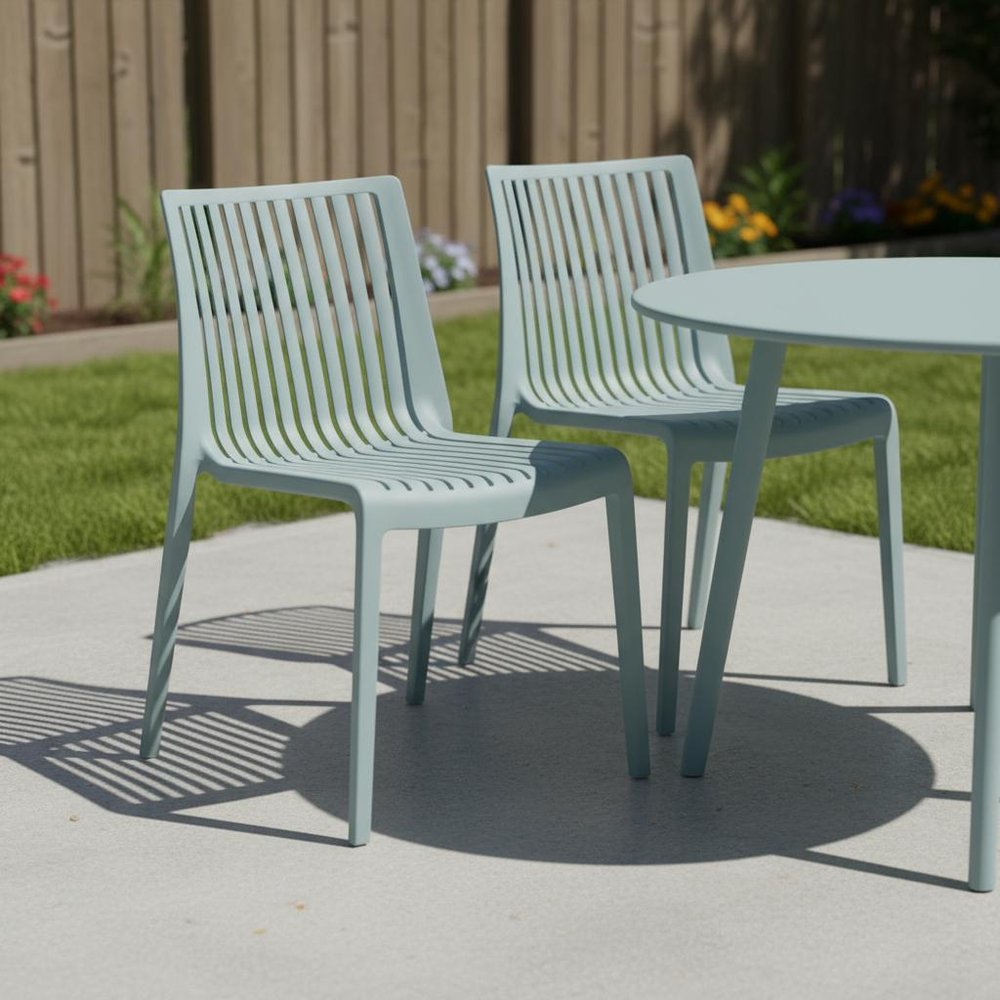 Set of Two Baby Blue Heavy Duty Plastic Outdoor Stacking Accent Chairs in a home interior