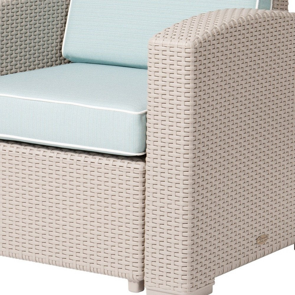 Close-up of 33" Gray Heavy Duty Plastic Outdoor Club Chair With Blue Cushion showing the plastic texture.