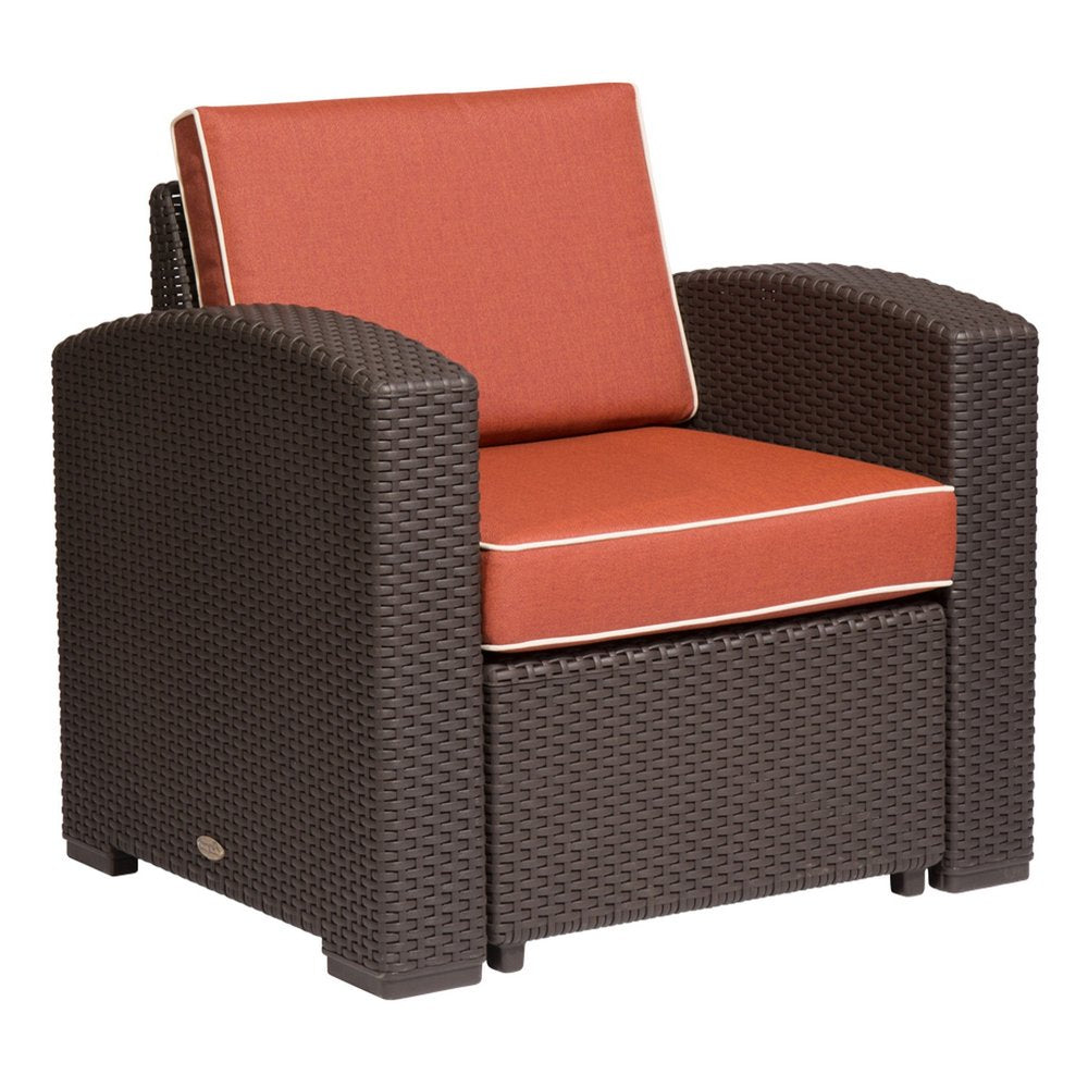 33" Red Heavy Duty Plastic Outdoor Accent Chair with Red Cushion. Outdoor chair isolated on a plain white background, showing a brown plastic surface.