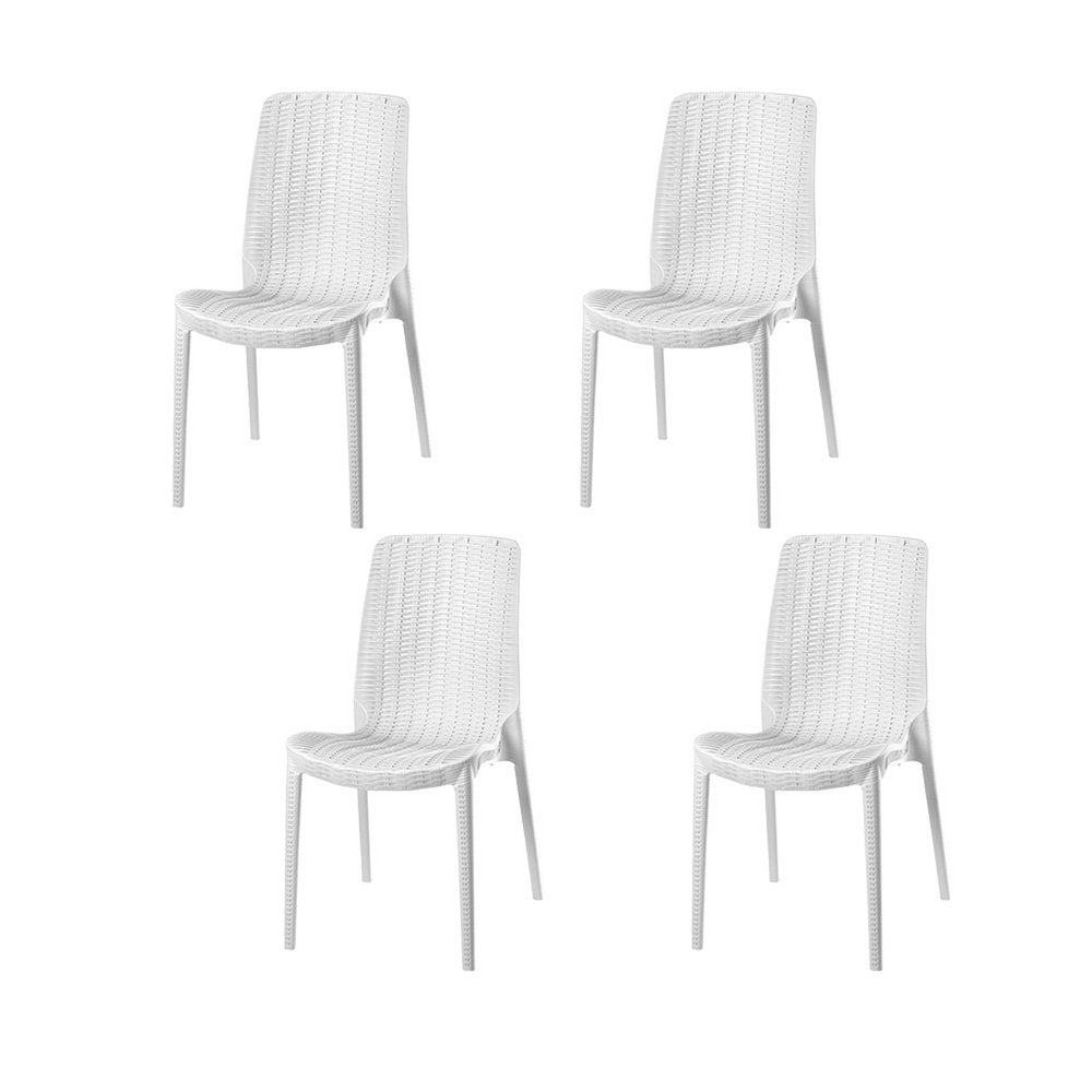 Set of Four White Heavy Duty Plastic Outdoor Stacking Dining Chairs on a white background