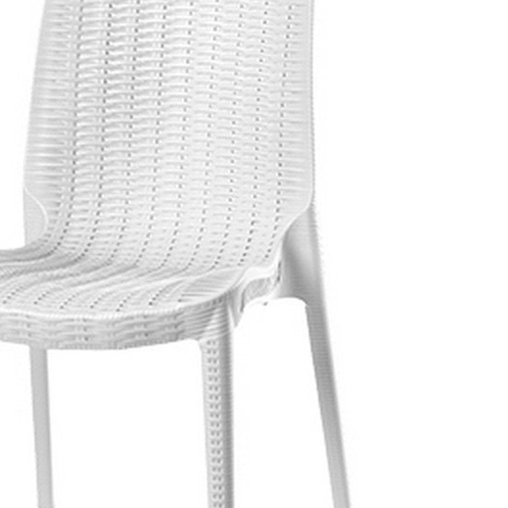 Set of Four White Heavy Duty Plastic Outdoor Stacking Dining Chairs on a white background