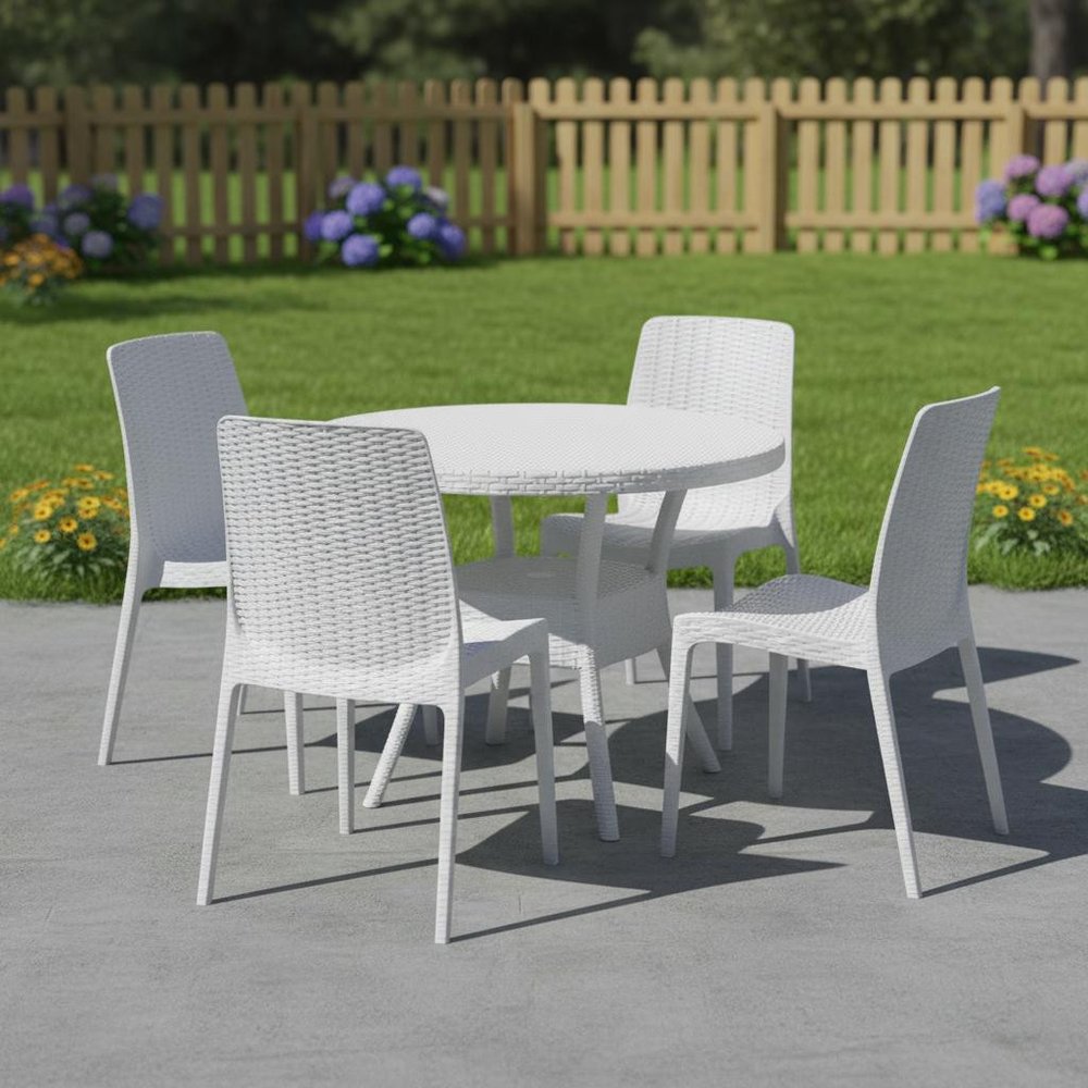 Set of Four White Heavy Duty Plastic Outdoor Stacking Dining Chairs in a home interior
