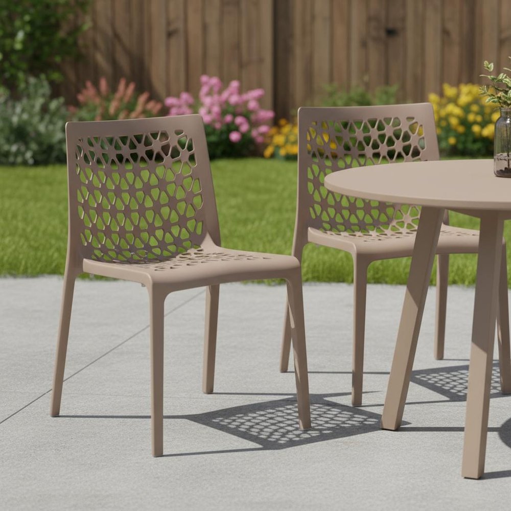 Set of Two Gray Heavy Duty Plastic Outdoor Stacking Dining Chairs in a home interior