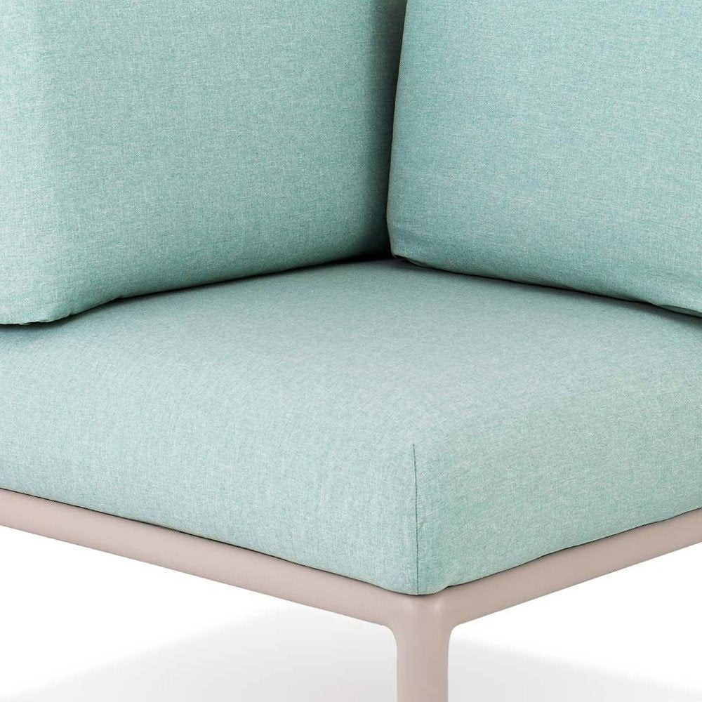 Cropped view of 31" Sea Green Heavy Duty Plastic Outdoor Modular with Sea Green Cushion focusing on the green plastic surface.