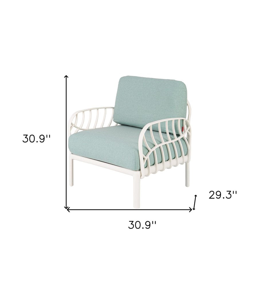 31" White Heavy Duty Plastic Outdoor Armchair With Sea Green Cushion. Outdoor chair isolated on a plain white background, in a white plastic finish.