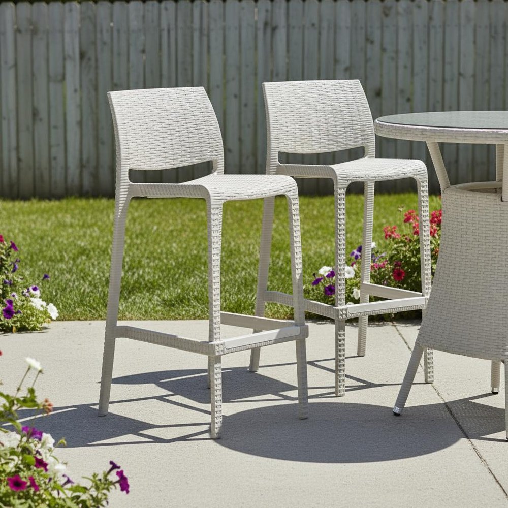 Set of Two 30" Taupe Faux Rattan Outdoor Bar Height Chairs in a home interior