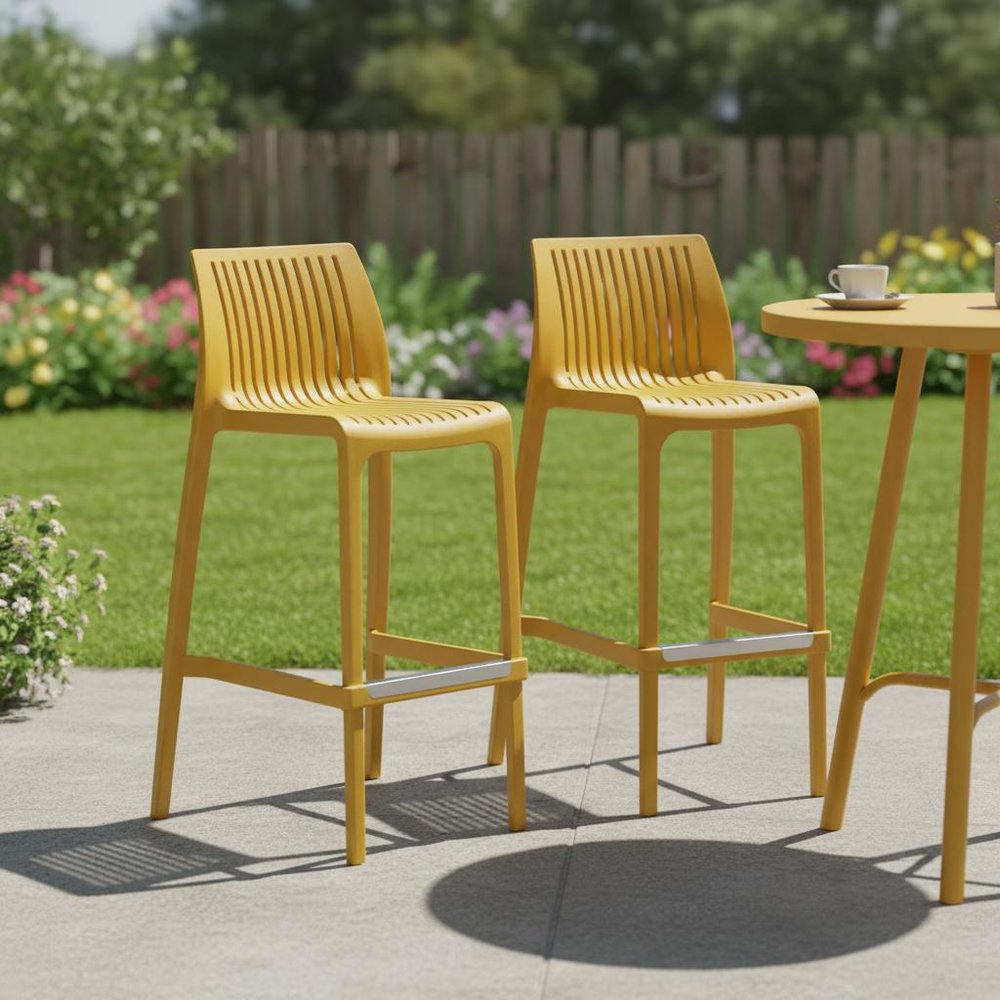 Set of Two 30" Yellow Heavy Duty Plastic Outdoor Bar Height Chairs in a home interior