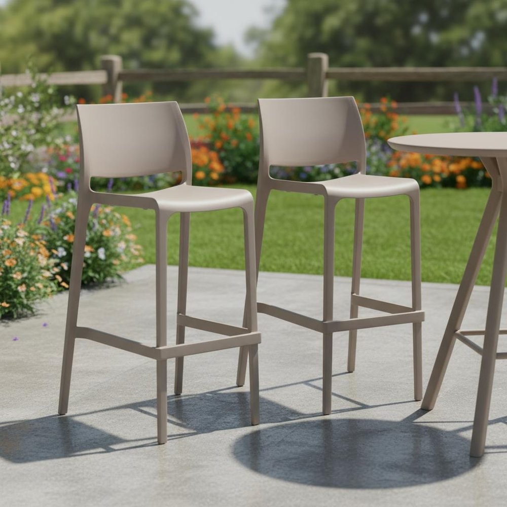Set of Two 30" Taupe Heavy Duty Plastic Low Back Outdoor Bar Height Chairs in a home interior