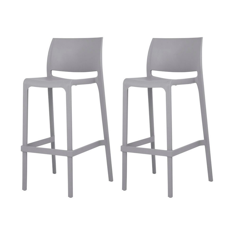 Two gray plastic low back outdoor bar height chairs on a white background.