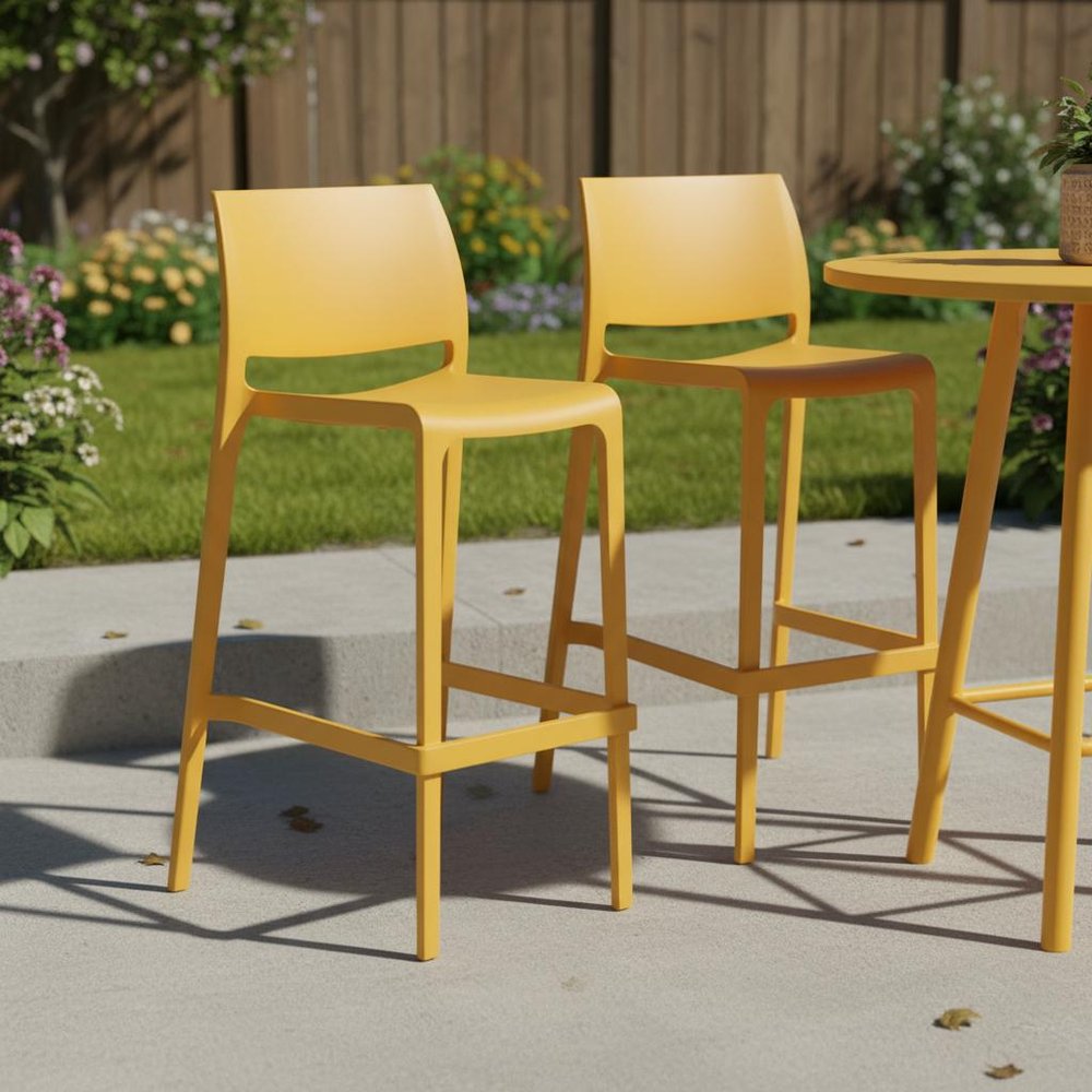 Set of Two 30" Yellow Heavy Duty Plastic Low Back Outdoor Bar Height Chairs in a home interior