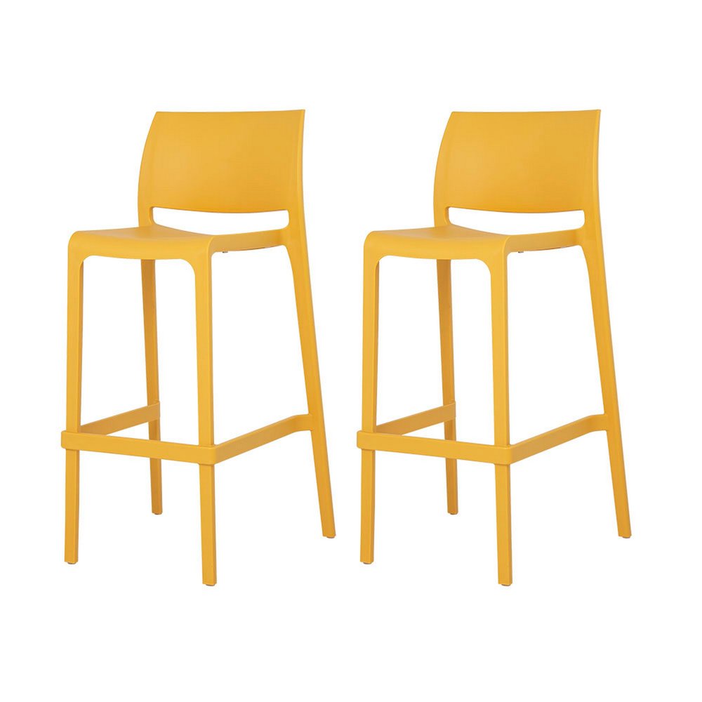 Two yellow heavy duty plastic low back outdoor bar height chairs on a white background.