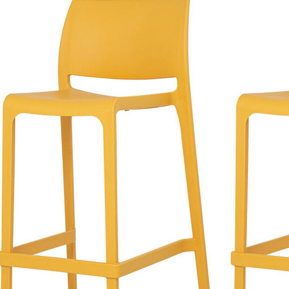 Set of Two 30" Yellow Heavy Duty Plastic Low Back Outdoor Bar Height Chairs on a white background